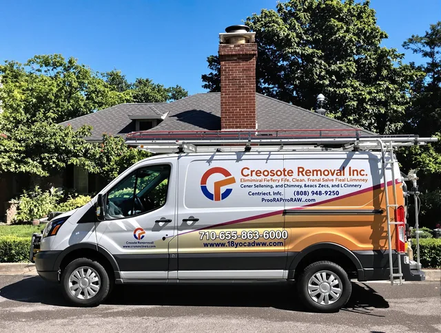 Strongsville Chimney Sweep technician removing creosote safely in Strongsville, OH